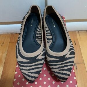 Brand is ALL BLACK flats size 9 never worn